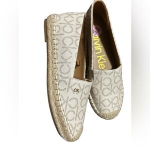 Elegant espadrilles Calvin Klein Cream Espadrilles with Monogram Pattern